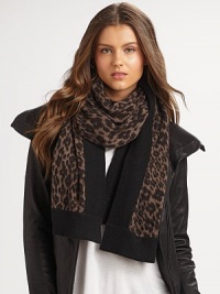 A luxuriously soft style with a solid contrast border. Cashmere About 68 X 25 Dry clean or hand wash Imported A luxuriously soft style with a solid contrast border. Cashmere About 68 X 25 Dry clean or hand wash Imported