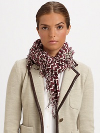 An ultra-warm, ultra-soft wool wrap with a bold zig-zag print and fringe trim.WoolAbout 45 X 45Dry cleanImported An ultra-warm, ultra-soft wool wrap with a bold zig-zag print and fringe trim.WoolAbout 45 X 45Dry cleanImported