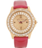 A burst of vivid gloss and shimmery shine packed into a darling timepiece, by Betsey Johnson. Crafted of fuchsia leather strap and round rose-gold tone stainless steel case. Bezel embellished with crystal accents. Textured rose-gold tone dial features ring of baguette-cut crystal accents, applied rose-gold tone Roman numerals at twelve and six o'clock, dot markers at three and nine o'clock, luminous hour and minute hands, signature fuchsia second hand and logo at twelve o'clock. Quartz movement. Water resistant to 30 meters. Two-year limited warranty.