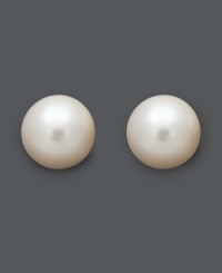 Effortless style that complements any ensemble. Belle de Mer's sweet stud earrings feature a 14k white gold setting cradling a cultured freshwater pearl (6-1/2-7 mm). Approximate diameter: 1/2 inch.
