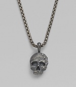 An antiqued skull pendant is crafted from pure sterling silver and hangs from a titanium box-chain necklace. From the Waves Collection Sterling silver Titanium chain, about 24 long Lobster clasp Imported 