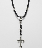 A traditional cross pendant is suspended from an impeccable strand of black onyx beads with sculpted skull detail for an edgy, modern update.Sterling silverBlack onyxLength about 26Toggle claspMade in USA