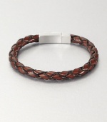 Braided brown Italian leather band with sterling silver clasp. Tension-held box clasp About 8½ long Embossed signature Made in United Kingdom