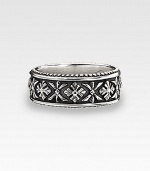 Modern and antiqued at once in sterling silver, finely crafted with handsome engraving. 8mm wide Made in USA