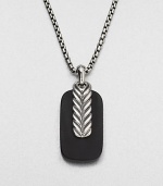 A simple sterling silver pendant necklace of black onyx is accented with chevron-textured sterling silver.Sterling silverBlack onyxLength, about 22 diam.Pendant, about ¾ x 1¼Imported