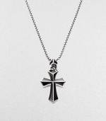 A rayskin-textured cross, crafted in sterling silver with contrasting onyx inlay. Sterling silver Onyx Pendant, about 2 long Necklace, about 20 long Imported 