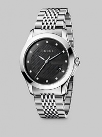 From the Timeless Collection. A stainless steel case set with 12 diamond markers is paired with a lacquered diamond-pattern dial. Ronda quartz 1042 movement Water-resistant to 3ATM Steel-polished case, 38mm, (1½) Scratch-resistant sapphire crystal face Diamond markers Second hand Date display at 4 o'clock Jewelry clasp Made in Switzerland From the Timeless Collection. A stainless steel case set with 12 diamond markers is paired with a lacquered diamond-pattern dial. Ronda quartz 1042 movement Water-resistant to 3ATM Steel-polished case, 38mm, (1½) Scratch-resistant sapphire crystal face Diamond markers Second hand Date display at 4 o'clock Jewelry clasp Made in Switzerland