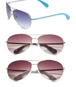 Classic metal aviator style with signature logo on plastic colored temples. Available in turquoise with blue gradient lens, tortoise with brown gradient lens, white with brown gradient lens, red with brown gradient lens, blue/silver with grey lens or ivory/copper with brown gradient lens. 100% UV protection Imported