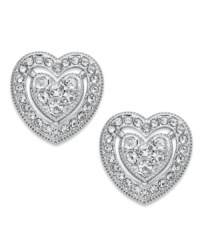 Turn on your heart light. Eliot Danori's crystal stud earrings help you shine on throughout the day. Set in rhodium-plated mixed metal. Approximate diameter: 1/2 inch. Turn on your heart light. Eliot Danori's crystal stud earrings help you shine on throughout the day. Set in rhodium-plated mixed metal. Approximate diameter: 1/2 inch.