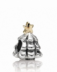 A timeless tannenbaum charm from PANDORA in sterling silver with a 14K gold star on top. A timeless tannenbaum charm from PANDORA in sterling silver with a 14K gold star on top.