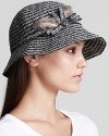 This oh-so-refined cloche from August Accessories plucks its style right from the runways, with natty feathered accents.