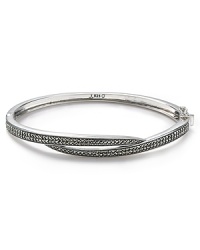 Judith Jack proves simple style can have an edge with this sterling silver bangle. Dipped in marcasite stones, it's crossover design adds seductive sparkle. Judith Jack proves simple style can have an edge with this sterling silver bangle. Dipped in marcasite stones, it's crossover design adds seductive sparkle.