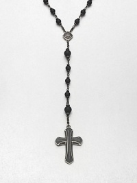 A simple, yet masculine addition to your ensemble, with a strand black onyx beads complemented by a sterling silver cross pendant.Sterling silverBlack onyxAbout 37, inner diam.About 7 dropImported A simple, yet masculine addition to your ensemble, with a strand black onyx beads complemented by a sterling silver cross pendant.Sterling silverBlack onyxAbout 37, inner diam.About 7 dropImported