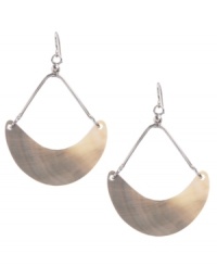 Inspire your look with a touch of summer. Kenneth Cole New York's beach-chic earrings feature shimmery shells in a half-moon shape. Set in silver tone mixed metal. Approximate drop: 2-1/4 inches. Inspire your look with a touch of summer. Kenneth Cole New York's beach-chic earrings feature shimmery shells in a half-moon shape. Set in silver tone mixed metal. Approximate drop: 2-1/4 inches.