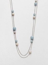 From the Sphere Collection. A long and graceful silver chain, to wrap as you choose, dotted with freshwater pearls and aquamarine beads.White cultured freshwater pearlsAquamarineSterling silverLength, about 45Special signature claspImported