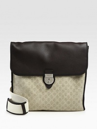 Flap messenger in leather-trimmed GG-Plus fabric.Flap and push lock closureAdjustable shoulder strapsInterior zip, cell phone and PDA pocketDark palladium hardware16W x 16H Made in Italy Flap messenger in leather-trimmed GG-Plus fabric.Flap and push lock closureAdjustable shoulder strapsInterior zip, cell phone and PDA pocketDark palladium hardware16W x 16H Made in Italy