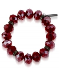 Paint the town red with this stretch bracelet from Kenneth Cole New York. Crafted from hematite-tone mixed metal, the bracelet features red faceted beads and pave glass crystal accents for visual appeal. Approximate length: 7-1/2 inches. Paint the town red with this stretch bracelet from Kenneth Cole New York. Crafted from hematite-tone mixed metal, the bracelet features red faceted beads and pave glass crystal accents for visual appeal. Approximate length: 7-1/2 inches.