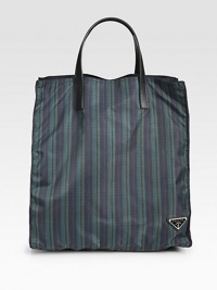 Modern plaid print design in lightweight nylon with double leather top handles.Double top handles14¼W x 15H x 7¾DMade in Italy Modern plaid print design in lightweight nylon with double leather top handles.Double top handles14¼W x 15H x 7¾DMade in Italy