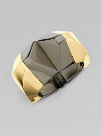 A shiny, two-tone geometric design for a futuristic look. BrassDiameter, about 2Hinged closureMade in Italy A shiny, two-tone geometric design for a futuristic look. BrassDiameter, about 2Hinged closureMade in Italy