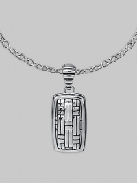 Polished silver with a military mind, crafted in a dogtag design with the look of laticework. From the Bedeg Collection Sterling silver Chain necklace 1W X 2¼L Lobster clasp Made in Bali Polished silver with a military mind, crafted in a dogtag design with the look of laticework. From the Bedeg Collection Sterling silver Chain necklace 1W X 2¼L Lobster clasp Made in Bali