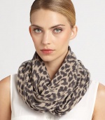 An endless design crafted of luxurious cashmere with a fierce animal print. Cashmere12 X 26½ loopDry cleanImported