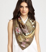 A sumptuous silk scarf dips into the wild with an abstract jungle print.SilkAbout 36 X 36Dry cleanMade in Italy