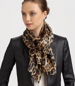 A wildly fashionable leopard print and metallic signature adds unmistakable style to a silk blend scarf.70% silk/30% nylonAbout 70 X 180Dry cleanMade in Italy