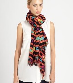 Wearable art takes a new form on this lightweight scarf adorned with a vibrant, tribal-inspired print and allover fringe trim.Viscose44 X 78Hand washImported