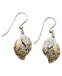 Triple your charm. Jody Coyote's two tone drop earrings feature an intricate textured overlay in a bronze and sterling silver setting. Approximate drop: 1-1/4 inches. Triple your charm. Jody Coyote's two tone drop earrings feature an intricate textured overlay in a bronze and sterling silver setting. Approximate drop: 1-1/4 inches.