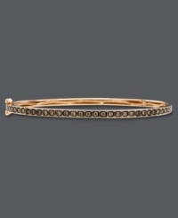 Slim, sparkly and perfect for stacking. Le Vian's stunning bangle bracelet features a seamless row of round-cut chocolate diamonds (1/2 ct. t.w.) in a rich 14k rose gold setting. Bracelet features a hinge clasp. Approximate length: 7-1/2 inches. Slim, sparkly and perfect for stacking. Le Vian's stunning bangle bracelet features a seamless row of round-cut chocolate diamonds (1/2 ct. t.w.) in a rich 14k rose gold setting. Bracelet features a hinge clasp. Approximate length: 7-1/2 inches.