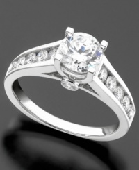 A stunning round-cut diamond solitaire is even more grandiose when accented by rows of round-cut diamonds (3/4 ct. t.w.). This engement ring is set in 14k white gold. A stunning round-cut diamond solitaire is even more grandiose when accented by rows of round-cut diamonds (3/4 ct. t.w.). This engement ring is set in 14k white gold.