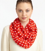 Lightweight wool is adorned with a 60's-inspired polka dot print for mod style.WoolAbout 17 X 77Dry cleanImported