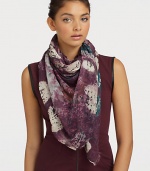 A palette of rich hues defines this elegant scarf, rendered in modal and cashmere and finished with eyelash fringe.90% modal/10% cashmereAbout 55 X 73Dry cleanImported