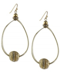 Well-rounded fashion from Jessica Simpson. These oval hoop earrings showcase round crystal accents. Crafted in antiqued gold tone mixed metal. Approximate drop: 2-1/2 inches. Well-rounded fashion from Jessica Simpson. These oval hoop earrings showcase round crystal accents. Crafted in antiqued gold tone mixed metal. Approximate drop: 2-1/2 inches.