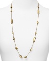 A smattering of gleaming rectangular bars dress up a simple chain on this long kate spade new york necklace, plated in gold.
