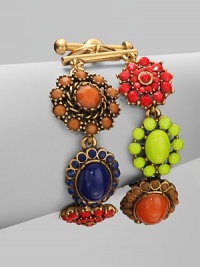 This statement style boosts a colorful, two-row link of hand-poured resin designs. Resin stonesBrass and pewterLength, about 7½ToggleclosureMade in USA This statement style boosts a colorful, two-row link of hand-poured resin designs. Resin stonesBrass and pewterLength, about 7½ToggleclosureMade in USA