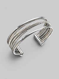 From the Silver Ice Crossover Collection. Crisscross rows of sterling silver and white gold - some smooth, some twisted, some paved with diamonds - create a shining look in this open strand cuff. Diamonds, 0.75 tcw Sterling silver & 14k white gold Cable, 3mm Diameter, about 2½ Width, about ¾ Made in USA