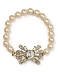 Indulge your penchant for pearls with this elegant bracelet from Carolee. With a hit of glitz, it easily adds panache to a crisp oxford or classic cardigan. Indulge your penchant for pearls with this elegant bracelet from Carolee. With a hit of glitz, it easily adds panache to a crisp oxford or classic cardigan.