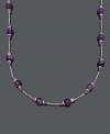 Perfect your look with a pop of regal color. Necklace features 60 carats of amethyst beads (4-5 mm and 9-10 mm) set in sterling silver with a tin-cup design. Approximate length: 18 inches.