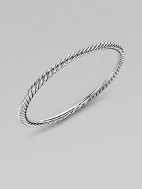 A simply twisted cable bangle of sterling silver is the essence of Yurman style. Sterling silver Cable, 4mm Diameter, about 2½ Made in USA