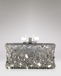 The ultimate in nighttime luxury: This leather Overture Judith Leiber clutch flaunts an au courant boxy shape, detailed with a pushlock closure and chunky-chic stones. The ultimate in nighttime luxury: This leather Overture Judith Leiber clutch flaunts an au courant boxy shape, detailed with a pushlock closure and chunky-chic stones.