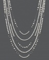 Polish your look in picturesque style. Necklace features five graduated strands of cultured freshwater pearls (6-10 mm) strung on delicate sterling silver strands of varying size and shape. Approximate lengths: 26, 29, 32, 35, and 38 inches.