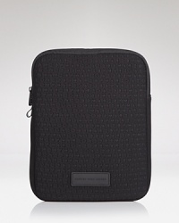 A logo-covered MARC BY MARC JACOBS tablet case perfects geek chic. A logo-covered MARC BY MARC JACOBS tablet case perfects geek chic.