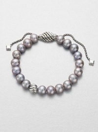 From the Spiritual Bead Collection. Luminous grey freshwater pearls on a sterling silver box chain with sterling silver cabled bead accents. 8mm grey freshwater pearlsSterling silverDiameter, about 7.75 adjustableBead closureImported From the Spiritual Bead Collection. Luminous grey freshwater pearls on a sterling silver box chain with sterling silver cabled bead accents. 8mm grey freshwater pearlsSterling silverDiameter, about 7.75 adjustableBead closureImported