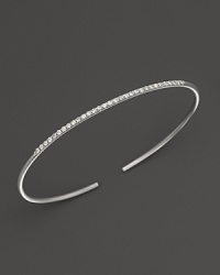 A simply modern diamond bangle in 14K white gold from Meira T. A simply modern diamond bangle in 14K white gold from Meira T.
