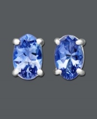 Add a drop of color to your ensemble in cool blue hues. Stud earrings feature oval-cut tanzanite (7/8 ct. t.w.) in 14k white gold. Approximate diameter: 1/4 inch.