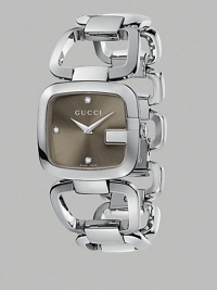 Elegant steel-link bracelet complements the G-framed case with diamond markers set on a sun-brushed dial. Quartz movement Water resistant to 30 meters Rectangular steel case, 32mm X 30mm Sun-brushed dial with three diamond markers Steel link bracelet Made in Switzerland Elegant steel-link bracelet complements the G-framed case with diamond markers set on a sun-brushed dial. Quartz movement Water resistant to 30 meters Rectangular steel case, 32mm X 30mm Sun-brushed dial with three diamond markers Steel link bracelet Made in Switzerland