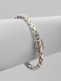 From the Classic Chain Collection. Essential Hardy, this flexible braid of sterling silver has a signature clasp.Sterling silver Length, about 7¼ Push-lock clasp Made in Bali
