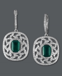 A style everyone will admire. Effy Collection's exquisite earrings features a diamond-coated (1 ct. t.w.) leaf pattern that highlights an emerald center stone (1-9/10 ct. t.w.). Set in 14k white gold. Emerald-cut emerald from Brazil. Approximate drop length: 1-1/4 inches. Approximate drop width: 2/3 inch. A style everyone will admire. Effy Collection's exquisite earrings features a diamond-coated (1 ct. t.w.) leaf pattern that highlights an emerald center stone (1-9/10 ct. t.w.). Set in 14k white gold. Emerald-cut emerald from Brazil. Approximate drop length: 1-1/4 inches. Approximate drop width: 2/3 inch.