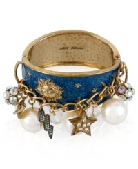 Quite striking. With lightning bolt and star baubles with glass crystal accents, as well as glass pearls, Betsey Johnson's bangle bracelet-crafted from gold-tone mixed metal-makes a stunning statement. Approximate diameter: 2-1/4 inches. Quite striking. With lightning bolt and star baubles with glass crystal accents, as well as glass pearls, Betsey Johnson's bangle bracelet-crafted from gold-tone mixed metal-makes a stunning statement. Approximate diameter: 2-1/4 inches.